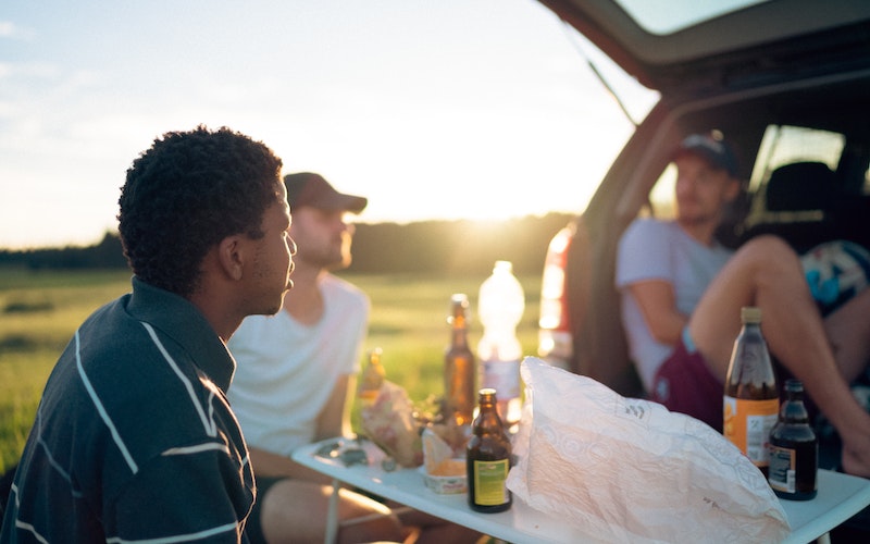 people eating lunch while car camping