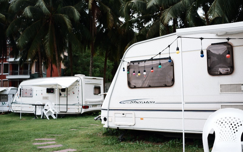 two white RVs used for camping
