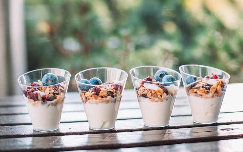 fruit and yogurt parfaits in glass cups